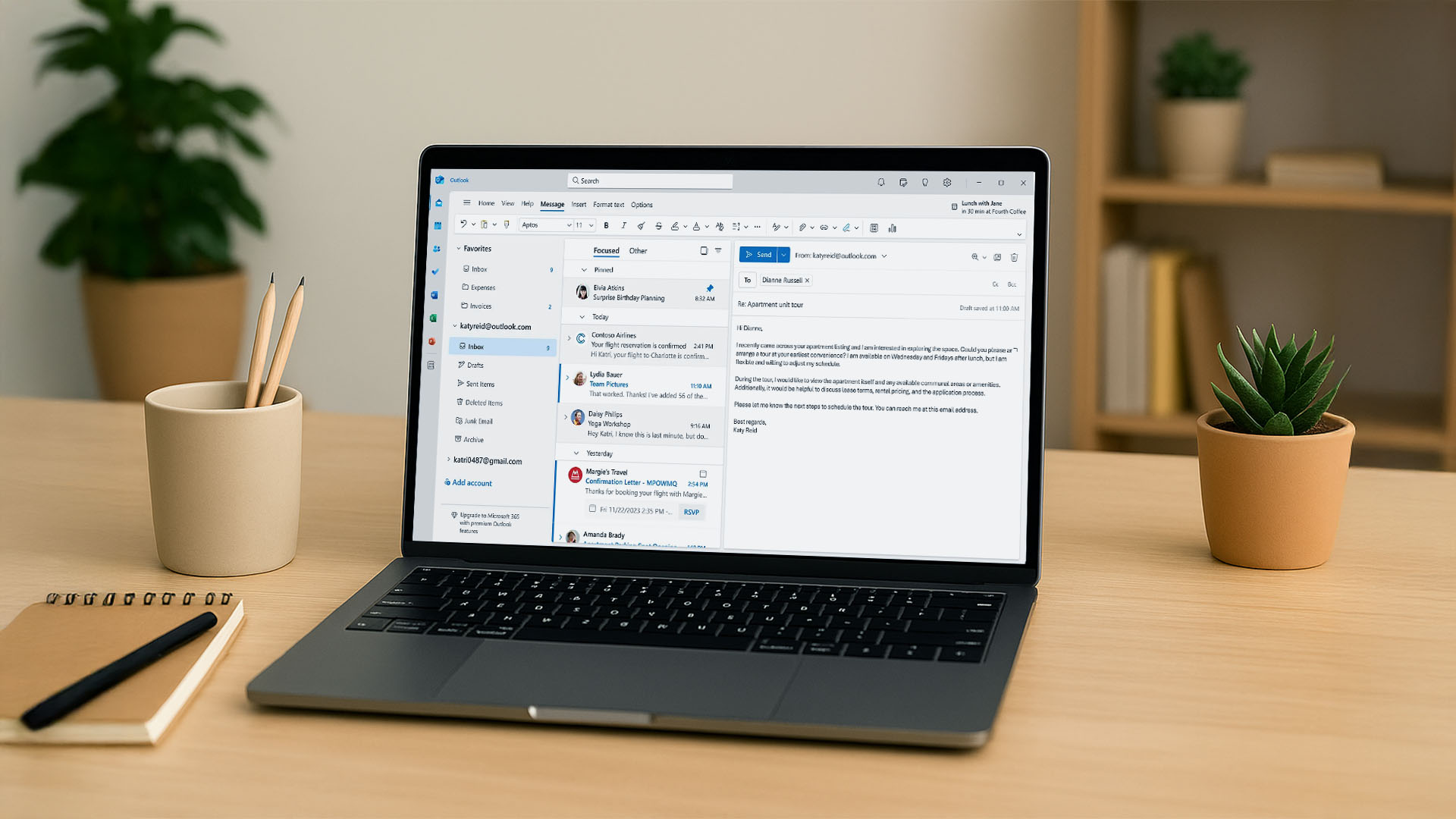 Laptop with newsletter preview and short video thumbnails